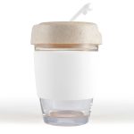 A reusable coffee cup featuring a clear glass base and a beige silicone band and lid. It has a straw.