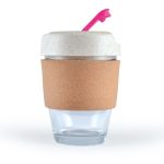 A reusable coffee cup with a cork band, clear base, and a white lid with a pink straw. It has a logo on it.