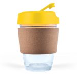 A reusable coffee cup with a transparent body, a cork band for insulation, and a bright yellow lid.