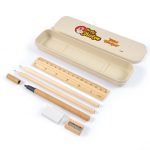 A stationery set featuring a storage case and includes a pencil, wooden ruler, sharpener, eraser, and a black pen.