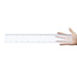 A transparent 30cm ruler held in a hand, featuring measurements in centimeters and inches.