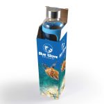 A drink bottle with a blue silicone sleeve, displayed in a cardboard box featuring a colorful marine design.