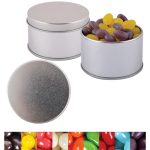 Silver round tin filled with assorted jelly beans in purple, yellow, and more colorful varieties. Tin has a smooth lid.