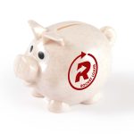 A small speckled pink piggy bank with a logo, featuring large eyes and a coin slot on top.