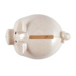 A small, eco-friendly pig-shaped coin bank with a light speckled finish and a slot for coins.