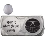 A silver sunshade featuring a smiley face and humorous text, folded in a circular shape.