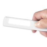 A Blaze Torch lighter is held in a hand, featuring a sleek design and a blank white label area for customization.