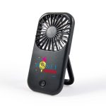 A portable fan with a sleek design featuring a branded logo. The fan includes a built-in stand for easy positioning.