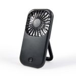 A portable Sirocco Fan with a sleek black design, featuring a foldable stand for easy placement.