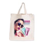 A cream-colored reusable grocery bag featuring a model wearing sunglasses and cosmetics branding, with a logo present.