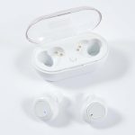 White Tempest TWS earbuds positioned outside their charging case, which is also white and features a clear lid.