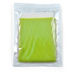 A green cooling towel packaged in a clear pouch. The towel features a mesh design for enhanced breathability.