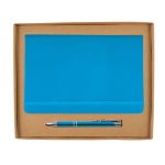 A blue notebook and blue pen are displayed inside a cardboard gift set box. The box is open.
