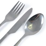 A stainless steel cutlery set featuring a fork, knife, and spoon in a calico pouch.