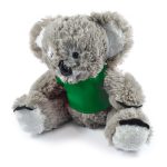 A plush toy koala with a green shirt, featuring soft, textured fur and large ears.