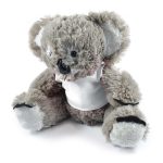 A plush koala toy named Korporate Koala featuring soft fur and a light-colored shirt.