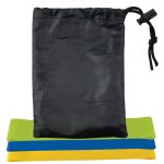 Three resistance bands in green, blue, and yellow stacked beneath a black storage pouch with a drawstring.