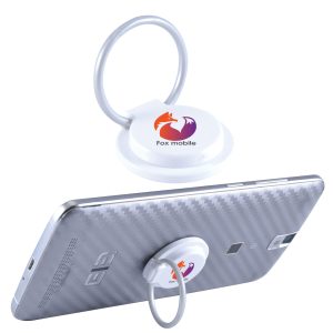 A white phone grip and stand with a ring attached, featuring a colorful logo, placed on a silver phone.
