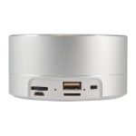 A Bluetooth speaker featuring a sleek silver design with various ports, including USB and audio input.