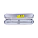 A silver metal pen housed in a sleek silver tin case with three additional components inside.