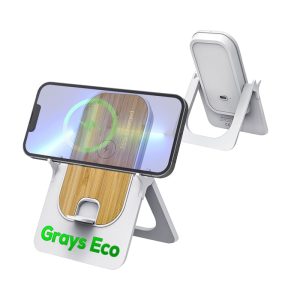 A wireless charging stand in white with a bamboo charging surface, featuring a logo and an illuminated phone display.