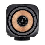 A black magnetic wireless car charger with a copper centre and a circular design, featuring a logo.