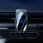 A fast wireless car charger in black, mounted on a car dashboard, holding a smartphone. Features a logo on the charger.