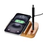 A wireless charger with a bamboo base, featuring a smartphone displaying a charging icon and a pen holder.