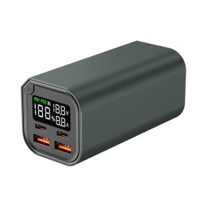 A green power bank with two USB ports and a digital display, featuring a cylindrical design.