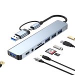 A metallic silver USB hub with multiple ports, including Type-C, Type-A, and card reader slots.