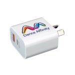 A white wall charger featuring two USB ports and a logo, designed for quick charging.
