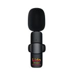 A black wireless microphone with a round top and a small logo, featuring a clip for attachment.