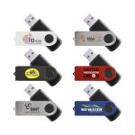 A collection of six mixed flash drives in various colours, featuring different logos and designs.
