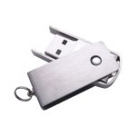 A silver metal flash drive with a sliding and swivelling mechanism, featuring a small keyring attachment.