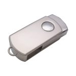 A silver swivel flash drive with a rounded top and a circular indentation, featuring a logo.