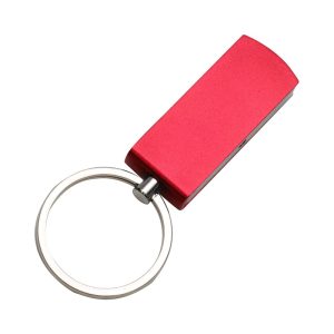 A red flash drive attached to a metal keyring. The device has a sleek, rounded rectangular shape and a logo.