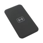 A black wireless charger with a simple design and a logo on the surface, ideal for charging devices.