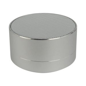 A silver Bluetooth speaker with a round design and a mesh top surface, featuring a sleek metallic finish.