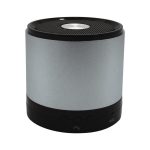 A silver Bluetooth speaker with a black base, featuring a mesh top and control buttons. It has a visible logo.