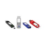 A collection of four flash drives in black, grey, blue, and red, each featuring a logo and distinct designs.