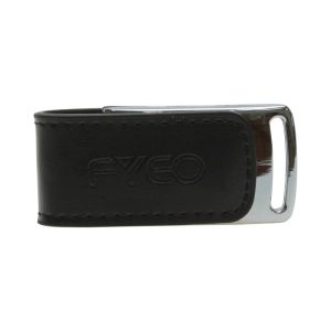 A sleek black leather flash drive with a silver metal clip and a subtle logo.