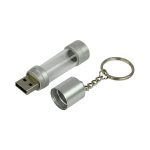 A silver USB flash drive with a transparent casing and a keychain attachment.