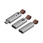 A silver flash drive with a brown attachment, featuring a USB connector and a sliding mechanism.