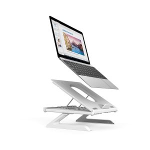 A white foldable laptop stand with an elevated laptop, designed for ergonomic use. It features a sleek, modern design.