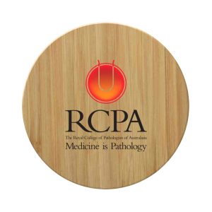 A round bamboo charger featuring a logo, designed as a wireless fast charger for phones.