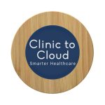 A round bamboo wireless charger featuring a dark circular centre with text and a light wooden outer edge.