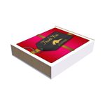 A gift box with a red and gold design featuring a black tag that says "Thank You." The box has a lid and a plain base.