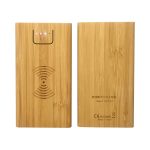A bamboo wireless power bank in natural wood finish, featuring an LED indicator and engraved design.