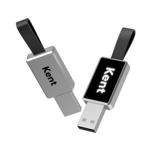 A silver flash drive with a black strap and a logo on the side, featuring a rectangular design.
