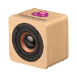 A wooden cube speaker with a black speaker cone and a logo on the top.